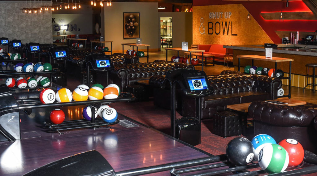 Roll With It: 810 Billiards and Bowling Strikes CityScape