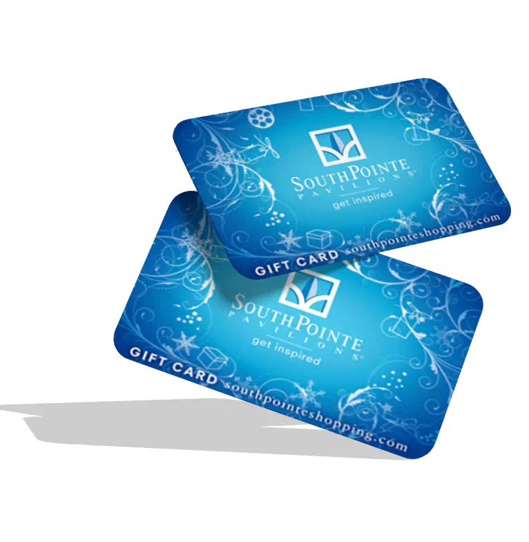 2 South Pointe Gift Cards stacked and floating in the air.